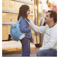 father-saying-goodbye-to-daughter-in-front-of-school-bus-2